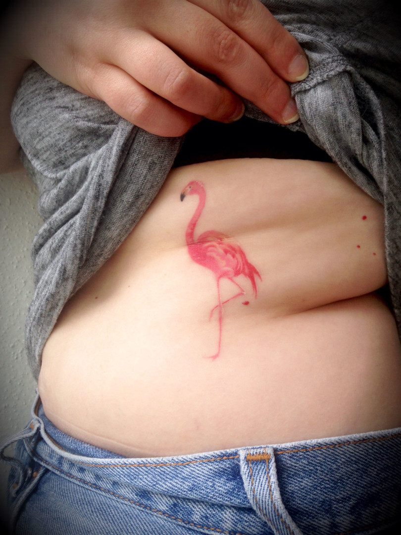 Tattoo of a pink flamingo